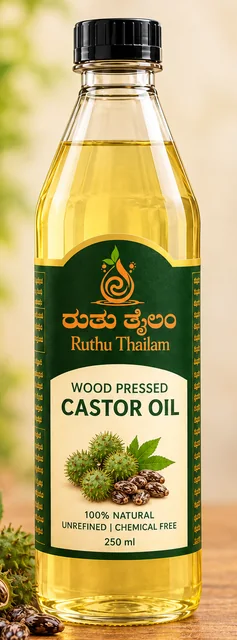 Castor oil bottle with castor pods and beans